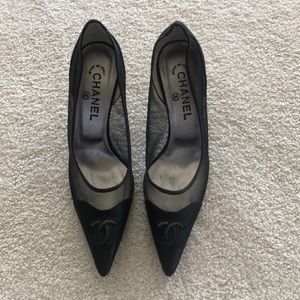 Women’s Chanel black and satin pumps